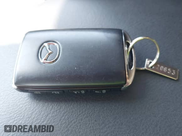 2023 Mazda CX-5 S Carbon Edition z VIN JM3KFBCMXP0282649, wystawiony jako IAAI lot #42784337 z przebiegiem 25 589 mil mil oraz . Historia ofert i sprzedaży dostępna na DreamBid. Obrazek 11.