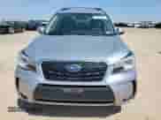 2017 Subaru Forester Touring z VIN JF2SJGWC6HH498784, wystawiony jako Copart lot #71694785 z przebiegiem 65 980 mil mil oraz Czysty tytuł • Clean title. Historia ofert i sprzedaży dostępna na DreamBid. Obrazek 5.