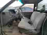 1991 Nissan Frontier z VIN 1N6SD11S9MC419923, wystawiony jako Copart lot #85189314 z przebiegiem 245 003 mil mil oraz Szkoda całkowita • Salvage title. Historia ofert i sprzedaży dostępna na DreamBid. Obrazek 7.