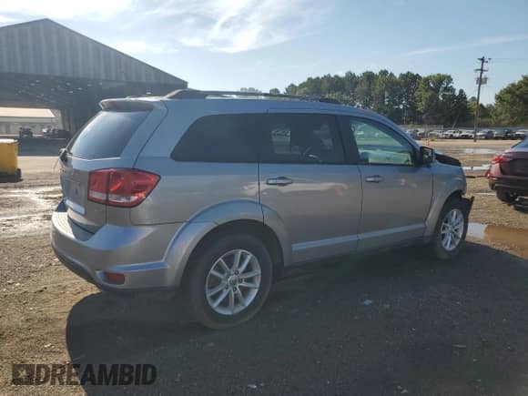 2017 Dodge Journey SXT with VIN 3C4PDDBG6HT574072, listed as a Copart auction lot 68840345 with 173,502 mi miles and Salvage title. Bid and sale history available at DreamBid. Image 3.