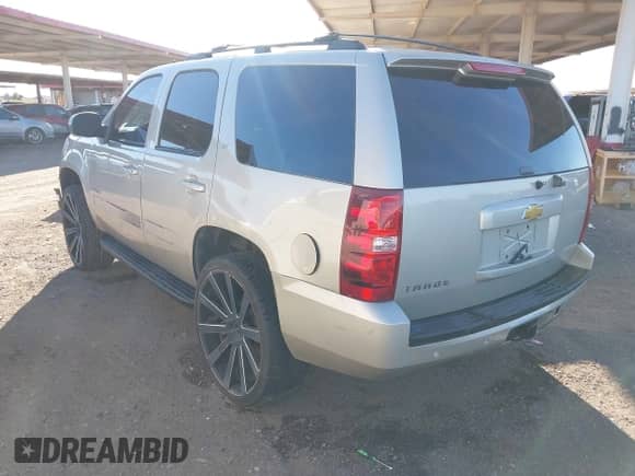 2013 Chevrolet Tahoe LT z VIN 1GNSCBE07DR143461, wystawiony jako IAAI lot #43349311 z przebiegiem 183 826 mil mil oraz . Historia ofert i sprzedaży dostępna na DreamBid. Obrazek 3.