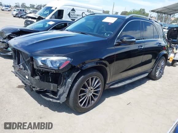 2023 Mercedes-Benz GLE 350 with VIN 4JGFB4JB1PA959788, listed as a IAAI auction lot 42013164 with 31,656 mi miles and . Bid and sale history available at DreamBid. Image 2.