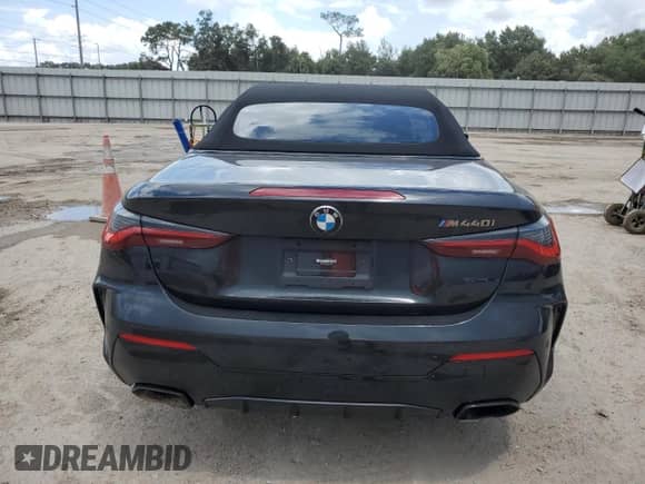 2022 BMW 4 Series M440i with VIN WBA53AT06NCK11740, listed as a Copart auction lot 63387673 with 10,184 mi miles and . Bid and sale history available at DreamBid. Image 6.