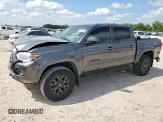 2021 Toyota Tacoma SR с VIN 3TYAX5GN3MT011905, выставлен на аукционе Copart как лот 70941795 с пробегом 60 500 миль миль и Списание • Salvage title. История ставок и продаж доступна на DreamBid. Изображение 1.