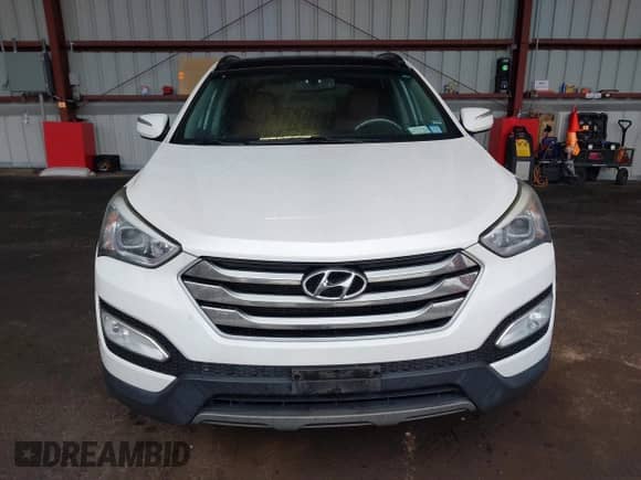 2015 Hyundai Santa Fe with VIN 5XYZWDLA2FG257231, listed as a IAAI auction lot 41868240 with 218,321 mi miles and . Bid and sale history available at DreamBid. Image 12.