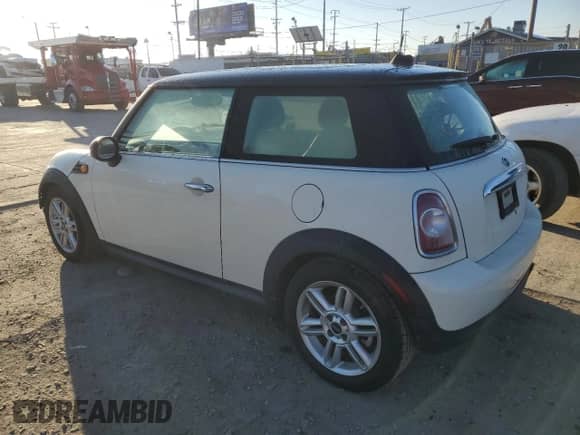 2012 MINI Hardtop with VIN WMWSU3C56CT262059, listed as a Copart auction lot 85857065 with 105,216 mi miles and Clean title. Bid and sale history available at DreamBid. Image 2.