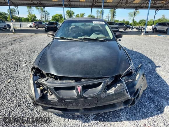 2000 Pontiac Grand Am GT z VIN 1G2NW52E0YC568337, wystawiony jako Copart lot #61053875 z przebiegiem 189 526 mil mil oraz Szkoda całkowita • Salvage title. Historia ofert i sprzedaży dostępna na DreamBid. Obrazek 5.
