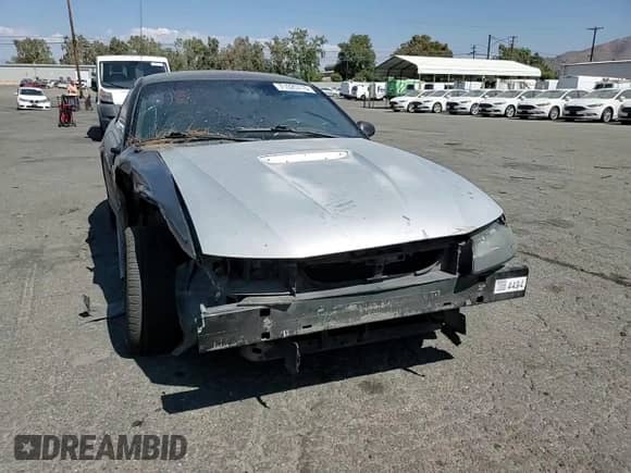 2003 Ford Mustang Standard z VIN 1FAFP40413F380800, wystawiony jako Copart lot #71020715 z przebiegiem 121 705 mil mil oraz Nie do naprawy • Non repairable. Historia ofert i sprzedaży dostępna na DreamBid. Obrazek 13.