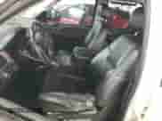 2009 Chevrolet Tahoe LTZ with VIN 1GNFK33059R291256, listed as a Copart auction lot 82418965 with 220,573 mi miles and Salvage title. Bid and sale history available at DreamBid. Image 7.