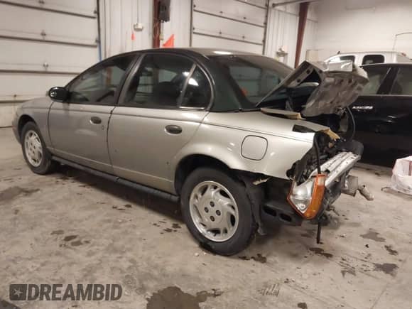 1997 Saturn SL with VIN 1G8ZH5280VZ172929, listed as a IAAI auction lot 41273214 with 134,972 mi miles and . Bid and sale history available at DreamBid. Image 3.