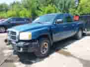2005 Dodge Dakota SLT with VIN 1D7HW48N25S112499, listed as a IAAI auction lot 42434700 with 216,817 mi miles and . Bid and sale history available at DreamBid. Image 2.