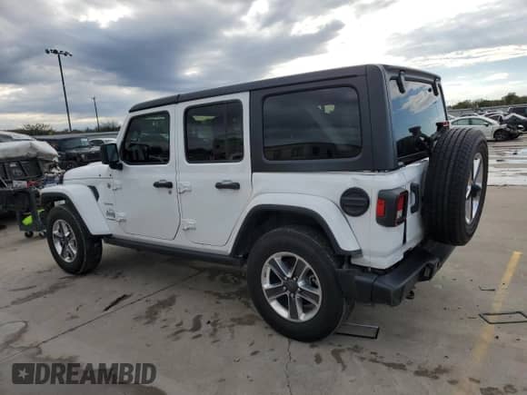 2023 Jeep Wrangler Sahara Altitude with VIN 1C4HJXEG5PW570629, listed as a Copart auction lot 80860234 with 15,121 mi miles and Salvage title. Bid and sale history available at DreamBid. Image 2.