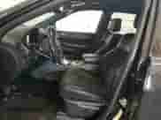 2019 Jeep Grand Cherokee Trailhawk with VIN 1C4RJFLG8KC613582, listed as a Copart auction lot 56102795 with 136,809 mi miles and Salvage title. Bid and sale history available at DreamBid. Image 7.