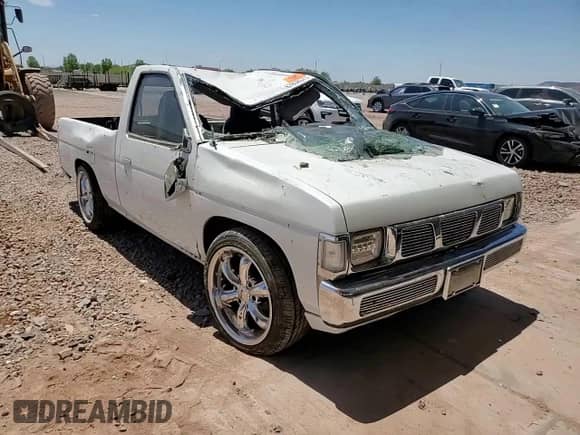 1995 Nissan Frontier with VIN 1N6SD11S7SC475209, listed as a Copart auction lot 67856375 with 246,193 mi miles and Salvage title. Bid and sale history available at DreamBid. Image 13.