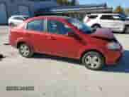 2011 Chevrolet Aveo 1LT with VIN KL1TD5DE6BB204921, listed as a Copart auction lot 76540974 with 71,165 mi miles and Salvage title. Bid and sale history available at DreamBid. Image 4.