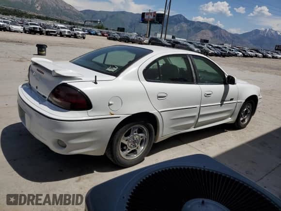 2002 Pontiac Grand Am GT z VIN 1G2NW52E42M549744, wystawiony jako Copart lot #57678605 z przebiegiem 220 067 mil mil oraz Szkoda całkowita • Salvage title. Historia ofert i sprzedaży dostępna na DreamBid. Obrazek 3.