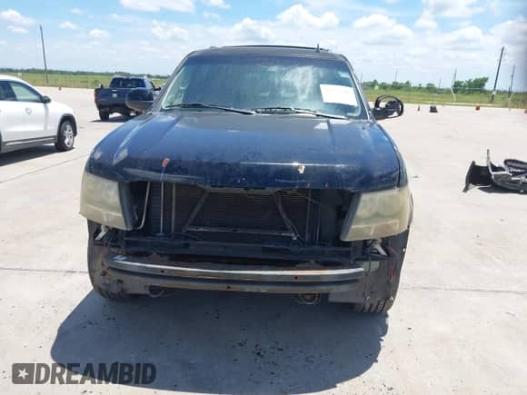 2013 Chevrolet Suburban LT with VIN 1GNSKJE71DR168382, listed as a IAAI auction lot 42821206 with 209,210 mi miles and . Bid and sale history available at DreamBid. Image 12.