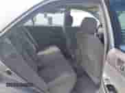 2005 Toyota Camry LE z VIN 4T1BE30K45U641113, wystawiony jako IAAI lot #43076182 z przebiegiem 199 467 mil mil oraz . Historia ofert i sprzedaży dostępna na DreamBid. Obrazek 8.