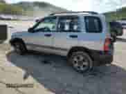 2002 Chevrolet Tracker with VIN 2CNBJ13C726912437, listed as a Copart auction lot 68384355 with 128,170 mi miles and Salvage title. Bid and sale history available at DreamBid. Image 2.