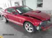2006 Ford Mustang GT Deluxe z VIN 1ZVFT82H765156662, wystawiony jako IAAI lot #43391359 z przebiegiem 62 554 mil mil oraz . Historia ofert i sprzedaży dostępna na DreamBid. Obrazek 1.