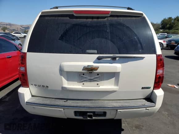 2011 Chevrolet Tahoe LTZ with VIN 1GNSKCE08BR225673, listed as a Copart auction lot 82283985 with 108,396 mi miles and Salvage title. Bid and sale history available at DreamBid. Image 6.