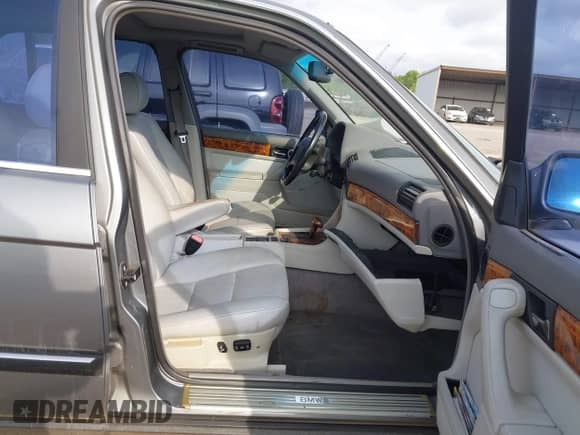 1994 BMW 7 Series with VIN WBAGD8323RDE87893, listed as a IAAI auction lot 42518003 with 196,154 mi miles and . Bid and sale history available at DreamBid. Image 5.