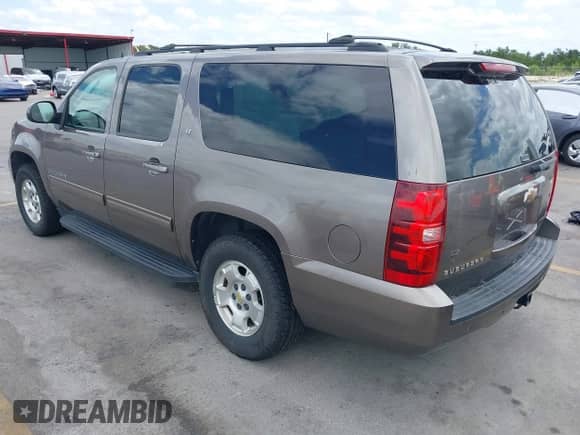2011 Chevrolet Suburban LT z VIN 1GNSCJE01BR261769, wystawiony jako IAAI lot #42624737 z przebiegiem 144 992 mil mil oraz . Historia ofert i sprzedaży dostępna na DreamBid. Obrazek 3.