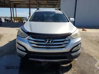 2013 Hyundai Santa Fe Sport z VIN 5XYZU3LBXDG062502, wystawiony jako Copart lot #89874145 z przebiegiem 190 130 mil mil oraz Szkoda całkowita • Salvage title. Historia ofert i sprzedaży dostępna na DreamBid. Obrazek 5.