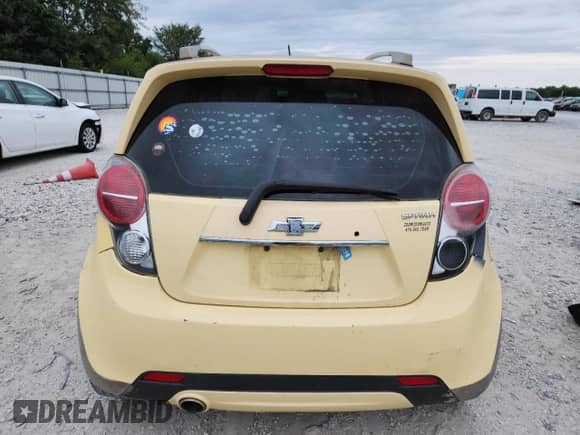 2013 Chevrolet Spark LT z VIN KL8CF6S93DC537131, wystawiony jako Copart lot #70428875 z przebiegiem 204 939 mil mil oraz Czysty tytuł • Clean title. Historia ofert i sprzedaży dostępna na DreamBid. Obrazek 6.