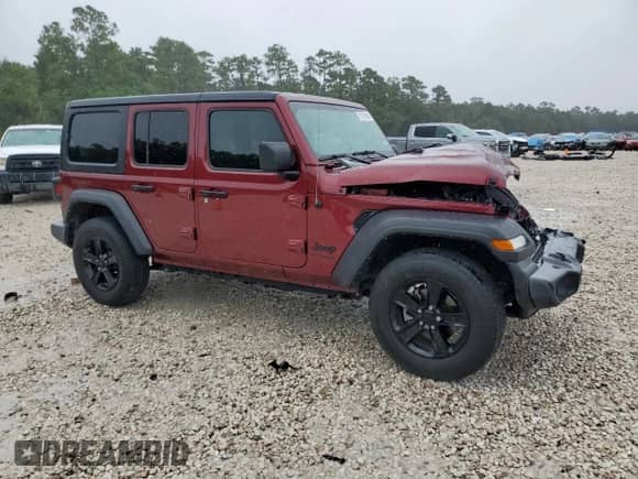 2022 Jeep Wrangler Unlimited High Tide with VIN 1C4HJXDG6NW105825, listed as a Copart auction lot 70315984 with 20,108 mi miles and Salvage title. Bid and sale history available at DreamBid. Image 4.