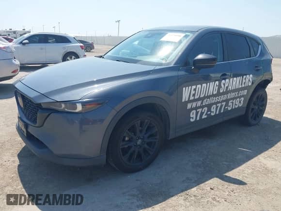2022 Mazda CX-5 S Preferred with VIN JM3KFBCM9N0529494, listed as a IAAI auction lot 43179890 with 57,495 mi miles and . Bid and sale history available at DreamBid. Image 18.