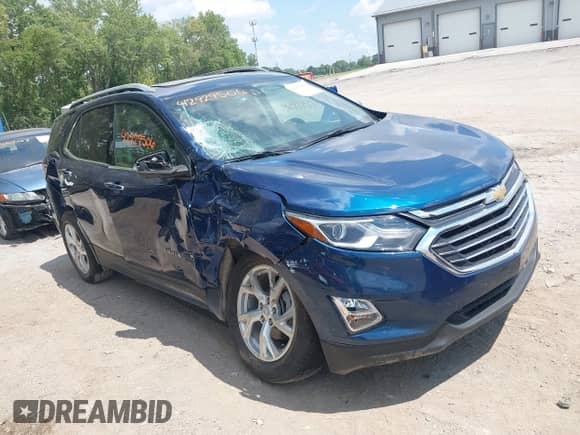 2021 Chevrolet Equinox Premier z VIN 2GNAXXEV4M6148508, wystawiony jako IAAI lot #42929506 z przebiegiem 59 861 mil mil oraz . Historia ofert i sprzedaży dostępna na DreamBid. Obrazek 6.