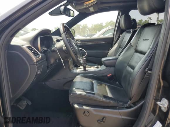2014 Jeep Grand Cherokee Summit with VIN 1C4RJFJT4EC508994, listed as a Copart auction lot 66526655 with 107,657 mi miles and Salvage title. Bid and sale history available at DreamBid. Image 7.