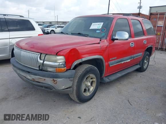 2002 Chevrolet Tahoe LS with VIN 1GNEC13V92R311538, listed as a IAAI auction lot 43337869 with 305,050 mi miles and . Bid and sale history available at DreamBid. Image 2.