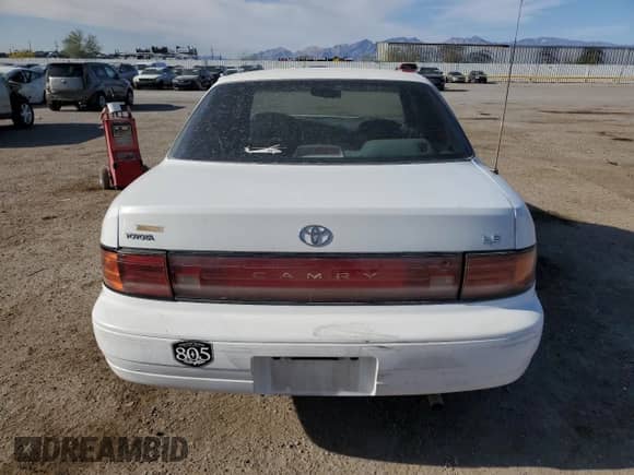1992 Toyota Camry LE с VIN 4T1SK12E0NU064956, выставлен на аукционе Copart как лот 50665925 с пробегом 228 909 миль миль и Списание • Salvage title. История ставок и продаж доступна на DreamBid. Изображение 6.