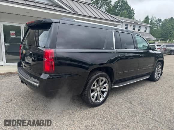 2016 Chevrolet Suburban LTZ с VIN 1GNSKJKC0GR282766, выставлен на аукционе Copart как лот 61401665 с пробегом 185 584 миль миль и Чистый • Clean title. История ставок и продаж доступна на DreamBid. Изображение 4.