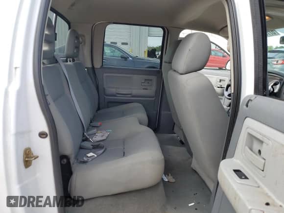 2006 Dodge Dakota SLT с VIN 1D7HE48N86S525225, выставлен на аукционе Copart как лот 82058025 с пробегом Не указан миль и Списание • Salvage title. История ставок и продаж доступна на DreamBid. Изображение 10.