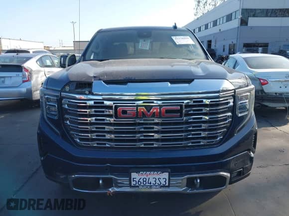 2023 GMC Sierra 1500 Denali z VIN 1GTUUGELXPZ168669, wystawiony jako IAAI lot #43378099 z przebiegiem 67 294 mil mil oraz . Historia ofert i sprzedaży dostępna na DreamBid. Obrazek 13.