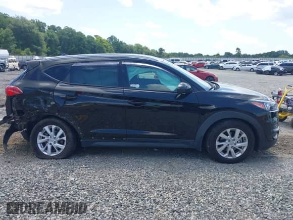 2021 Hyundai Tucson Value with VIN KM8J33A44MU375771, listed as a IAAI auction lot 42759887 with 50,586 mi miles and . Bid and sale history available at DreamBid. Image 13.
