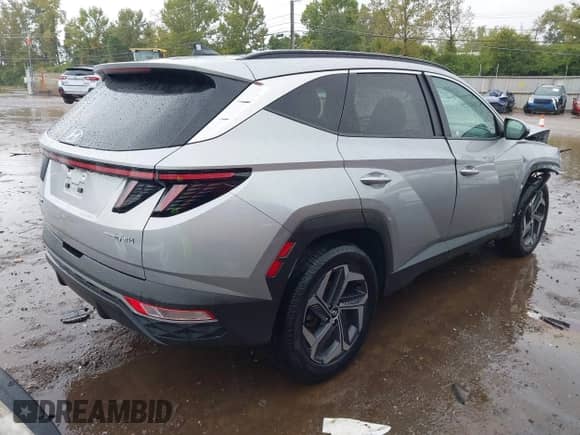 2022 Hyundai Tucson SEL Convenience with VIN KM8JFCA18NU077285, listed as a IAAI auction lot 43394135 with 40,947 mi miles and . Bid and sale history available at DreamBid. Image 4.