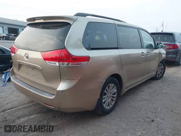2011 Toyota Sienna XLE AAS with VIN 5TDYK3DC2BS045525, listed as a IAAI auction lot 43158126 with 151,128 mi miles and . Bid and sale history available at DreamBid. Image 4.