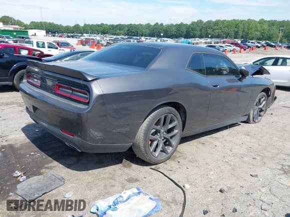 2023 Dodge Challenger SXT with VIN 2C3CDZAG1PH654517, listed as a IAAI auction lot 42600570 with 34,214 mi miles and . Bid and sale history available at DreamBid. Image 4.