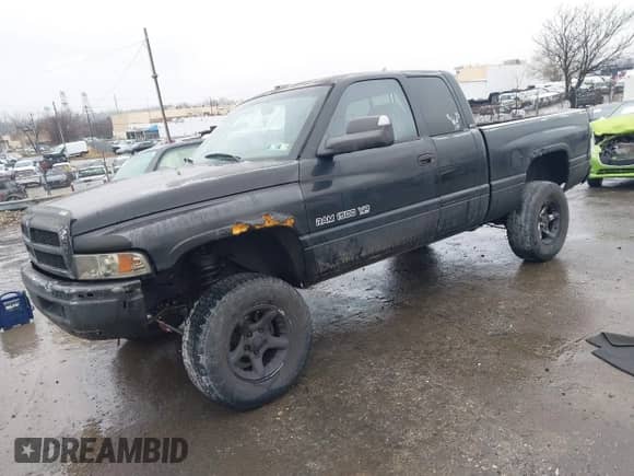 2001 Dodge 1500 with VIN 3B7HF13Y91G763348, listed as a IAAI auction lot 41510274 with 207,408 mi miles and . Bid and sale history available at DreamBid. Image 2.