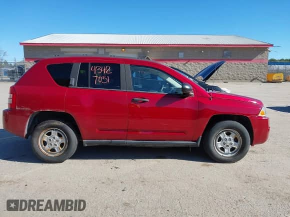 2007 Jeep Compass Sport with VIN 1J8FF47WX7D203953, listed as a IAAI auction lot 43427051 with 142,880 mi miles and . Bid and sale history available at DreamBid. Image 14.
