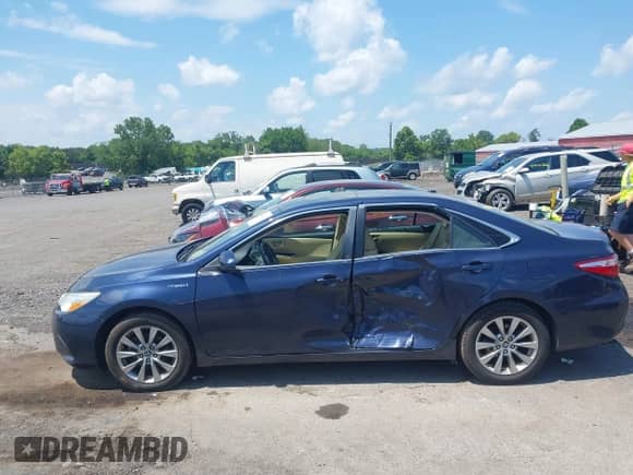 2015 Toyota Camry LE with VIN 4T1BD1FK8FU165173, listed as a IAAI auction lot 42662431 with 297,983 mi miles and . Bid and sale history available at DreamBid. Image 14.