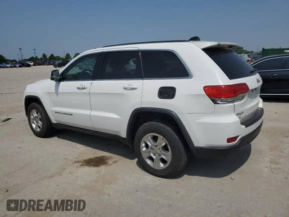 2014 Jeep Grand Cherokee Laredo z VIN 1C4RJFAG5EC289207, wystawiony jako Copart lot #57971885 z przebiegiem 149 465 mil mil oraz Szkoda całkowita • Salvage title. Historia ofert i sprzedaży dostępna na DreamBid. Obrazek 2.