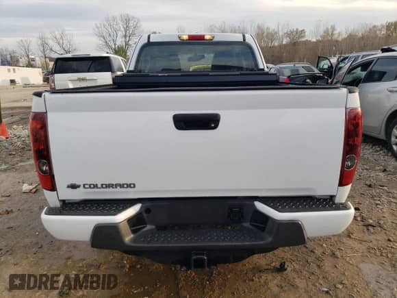 2012 Chevrolet Colorado Work Truck z VIN 1GCESBFE4C8170138, wystawiony jako Copart lot #81182724 z przebiegiem 111 687 mil mil oraz Szkoda całkowita • Salvage title. Historia ofert i sprzedaży dostępna na DreamBid. Obrazek 6.