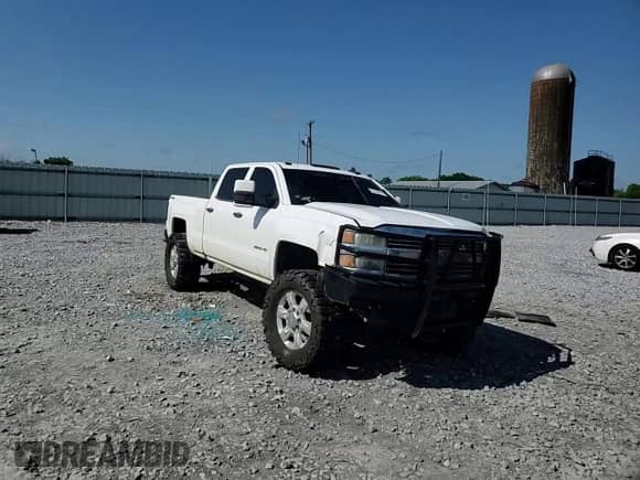 2015 Chevrolet Silverado 2500HD Work Truck z VIN 1GC1KUEG7FF663731, wystawiony jako Copart lot #57123715 z przebiegiem 167 082 mil mil oraz Szkoda całkowita • Salvage title. Historia ofert i sprzedaży dostępna na DreamBid. Obrazek 13.