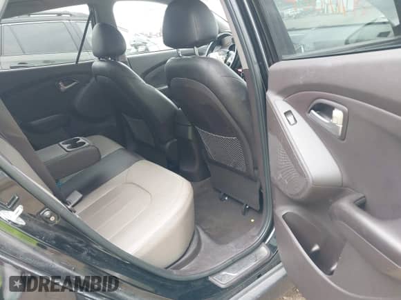 2012 Hyundai Tucson GLS with VIN KM8JU3ACXCU519889, listed as a IAAI auction lot 43041175 with 157,398 mi miles and . Bid and sale history available at DreamBid. Image 8.