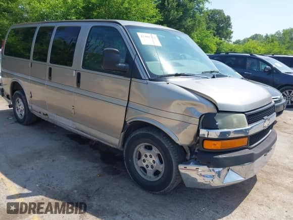 2004 Chevrolet Express Passenger with VIN 1GBFG15T041157045, listed as a IAAI auction lot 42486752 with 319,752 mi miles and . Bid and sale history available at DreamBid. Image 1.